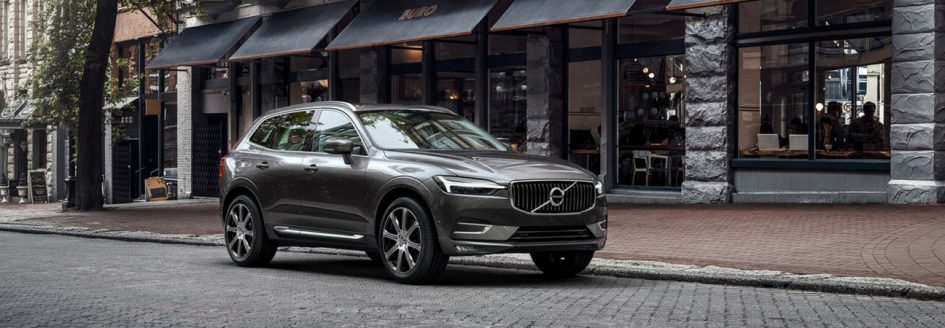 2019 Volvo XC60 parked in front of storefront